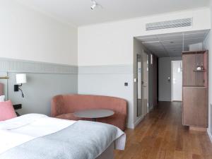 Postel nebo postele na pokoji v ubytování Elite Palace Hotel & Spa