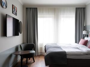 Postel nebo postele na pokoji v ubytování Elite Palace Hotel & Spa