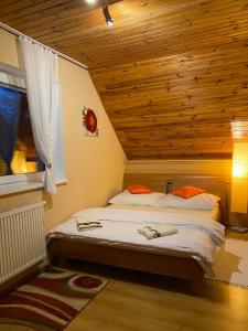 Posteľ alebo postele v izbe v ubytovaní Apartmánový dom Anna