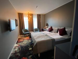 Postel nebo postele na pokoji v ubytování Elite Palace Hotel & Spa