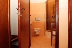 Koupelna v ubytování Rezydencja Piastowska + 53 fotografií