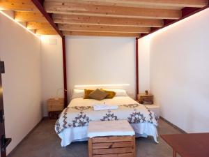 Säng eller sängar i ett rum på Cal Teixidor