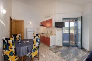 Kuchyň nebo kuchyňský kout v ubytování Apartments Lapida