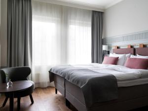 Postel nebo postele na pokoji v ubytování Elite Palace Hotel & Spa