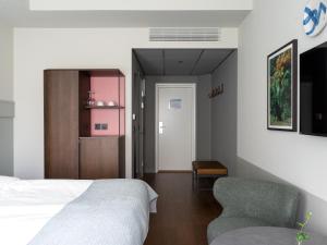 Postel nebo postele na pokoji v ubytování Elite Palace Hotel & Spa