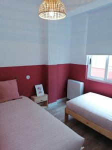 Łóżko lub łóżka w pokoju w obiekcie Apartamento completamente equipado centro Ferrol