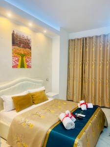 A bed or beds in a room at Santa Maria Accommodation