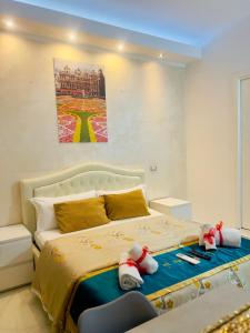 A bed or beds in a room at Santa Maria Accommodation