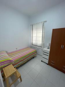 En eller flere senge i et værelse på HUELVA CENTRO, Luminoso y Funcional - 4 DORMITORIOS