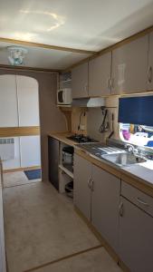 Photo de la galerie de l'établissement Mobil home avec terrasse camping du gouffre numéro 88 plougrescant, à Plougrescant