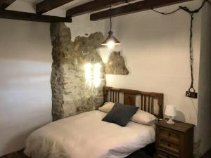 En eller flere senge i et værelse på 4 bedrooms house with shared pool and wifi at Granada