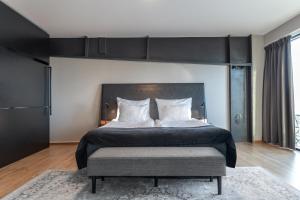 Postel nebo postele na pokoji v ubytování Quality Hotel 11 & Eriksbergshallen + 37 fotografií