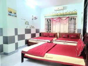 Кровать или кровати в номере Motel Thành Đạt