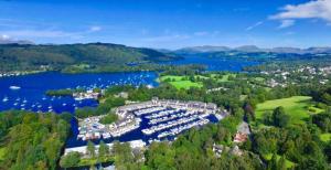 an aerial view of a marina on a lake at Storrs Gate House in Bowness-on-Windermere