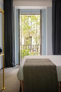 Armesto Rooms客房内的一张或多张床位