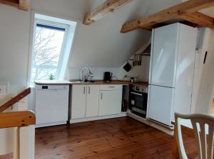 Kjøkken eller kjøkkenkrok på Gæstehus Sorø Sø