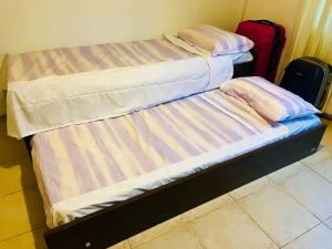 Säng eller sängar i ett rum på La Casona