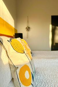 Кровать или кровати в номере Guesthouse De Wissen