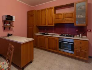 Kuchyň nebo kuchyňský kout v ubytování Casa Monet