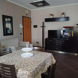 A kitchen or kitchenette at NSM Casa di Fulmine attico con box privato