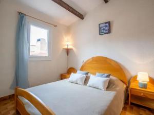 En eller flere senge i et værelse på St Cyprien superbe maison de vacances