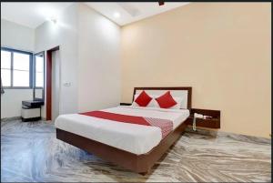 Voodi või voodid majutusasutuse HOTEL BAGARIA PALACE toas