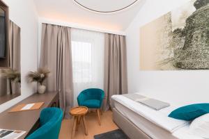 Postel nebo postele na pokoji v ubytování Hotel Sveta Ana