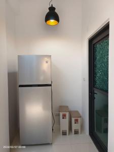 Kuchyň nebo kuchyňský kout v ubytování 墾丁堡雅1號 電梯包棟民宿