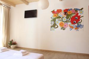 TV a/nebo společenská místnost v ubytování Art Guest House