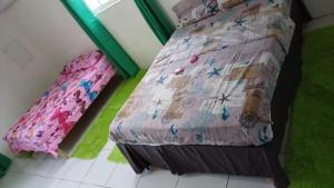 Postel nebo postele na pokoji v ubytování Eloise Appartement