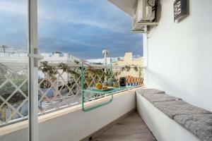 a balcony with a view of a city at Nordik Rooms Urban - Segalerva "Geiranger" in Málaga