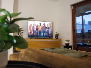 A television and/or entertainment centre at PENTHOUSE Synagogue - by Artemisia Luxury Apartments