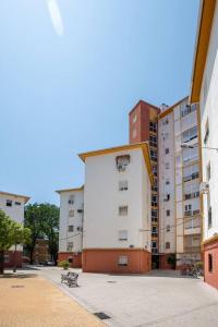 a group of tall buildings in a city at Studio with wifi at Sevilla in Seville