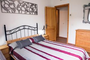 A bed or beds in a room at Almotaje, numero 3