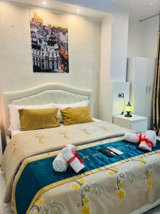 A bed or beds in a room at Santa Maria Accommodation