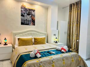 A bed or beds in a room at Santa Maria Accommodation