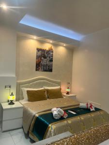 A bed or beds in a room at Santa Maria Accommodation