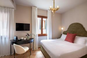 Cama ou camas em um quarto em Daplace - Antica Casa Coppo