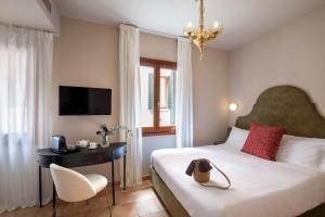 Cama ou camas em um quarto em Daplace - Antica Casa Coppo