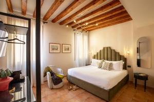 Cama ou camas em um quarto em Daplace - Antica Casa Coppo