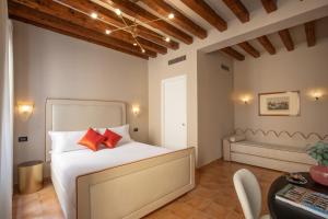 Cama ou camas em um quarto em Daplace - Antica Casa Coppo