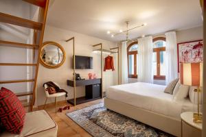 Cama ou camas em um quarto em Daplace - Antica Casa Coppo