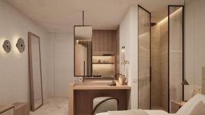 a bathroom with a sink and a mirror at The Wave in Sidari