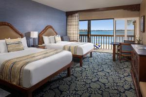 Ένα ή περισσότερα κρεβάτια σε δωμάτιο στο Catamaran Resort Hotel and Spa