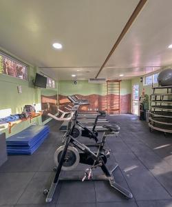 a room with a gym with a exercise bike at Gran Lençóis Flat Residence in Barreirinhas