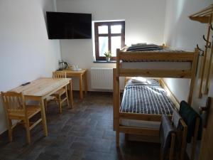 Postel nebo postele na pokoji v ubytování Penzion U vlka