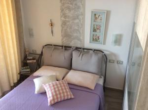 Postel nebo postele na pokoji v ubytování Iris Apartments + 46 fotografií