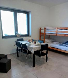 Postel nebo postele na pokoji v ubytování Ubytovanie u Slovana - Apartmán 1