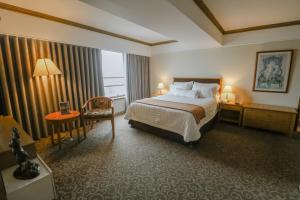 Postel nebo postele na pokoji v ubytování Hotel Miramar