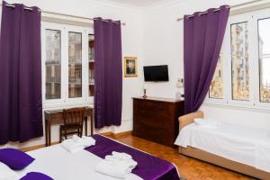 מיטה או מיטות בחדר ב-Suite Cervantes